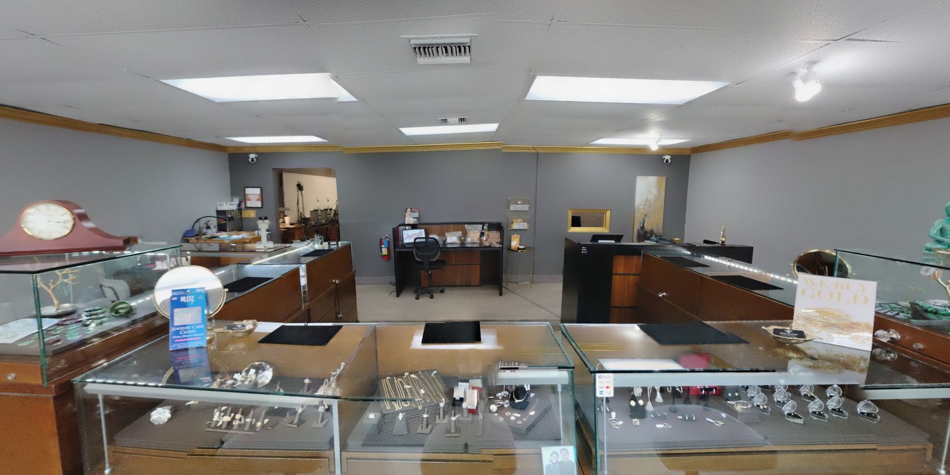 Inside the Arnel Jewelry Monterey Store: glass display cases of jewelry